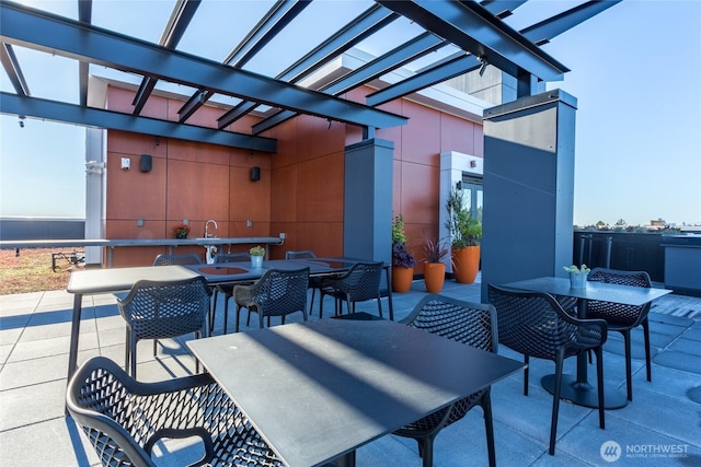 1085 103rd Ave NE Unit 217, Bellevue, WA 98004 - view of patio / terrace with outdoor dining area