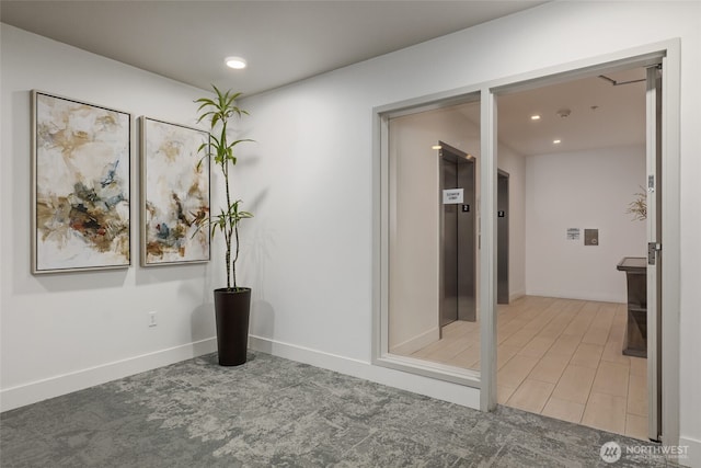 1085 103rd Ave NE Unit 217, Bellevue, WA 98004 - unfurnished room with recessed lighting and elevator