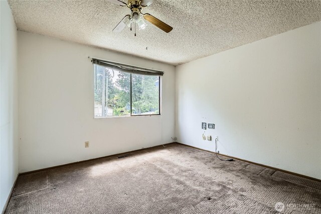 2708 NE 106th Pl, Seattle, WA 98125 - carpeted empty room with a textured ceiling and a ceiling fan