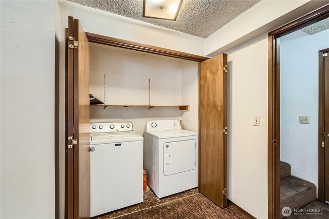 2708 NE 106th Pl, Seattle, WA 98125 - washroom featuring washing machine and clothes dryer and a textured ceiling