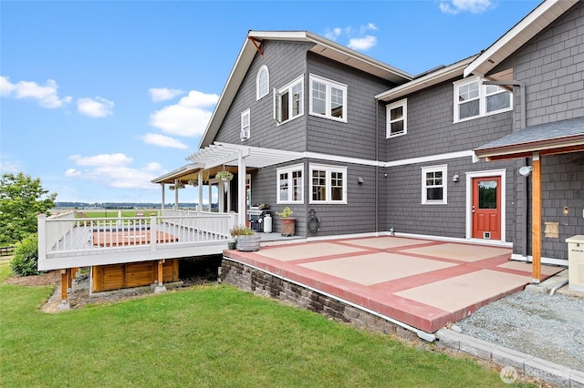 20076 Sinnes Rd, Mount Vernon, WA 98274 - back of property featuring a wooden deck and a yard