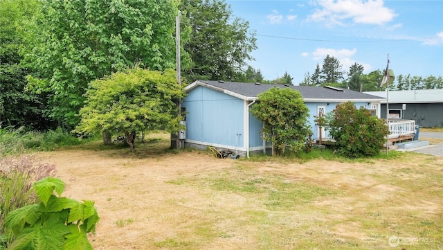 16880 Hwy 112, Clallam Bay, WA 98326 - view of green lawn featuring a deck