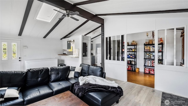 16880 Hwy 112, Clallam Bay, WA 98326 - living area featuring ceiling fan, wood finished floors, and a skylight