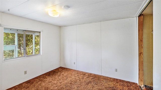 16880 Hwy 112, Clallam Bay, WA 98326 - carpeted empty room featuring a smoke detector