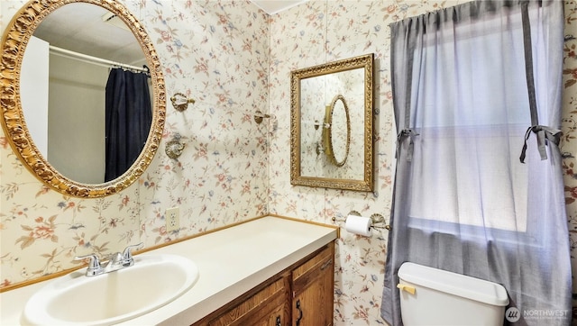 16880 Hwy 112, Clallam Bay, WA 98326 - bathroom featuring wallpapered walls and vanity