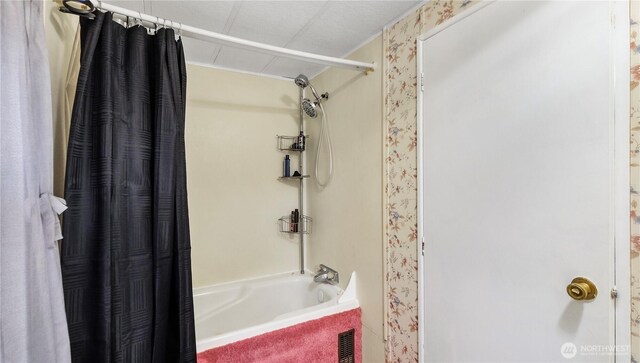 16880 Hwy 112, Clallam Bay, WA 98326 - full bathroom featuring shower / bath combo with shower curtain and wallpapered walls