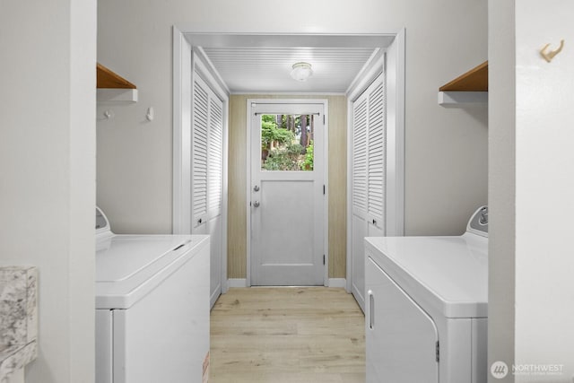 852 NE 194th St, Shoreline, WA 98155 - washroom featuring washing machine and dryer and light wood-type flooring