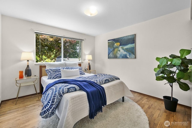 852 NE 194th St, Shoreline, WA 98155 - bedroom featuring wood finished floors and baseboards