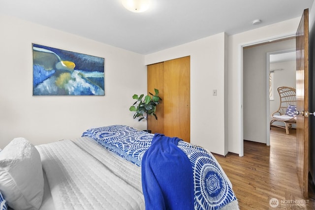 852 NE 194th St, Shoreline, WA 98155 - bedroom with wood finished floors and a closet