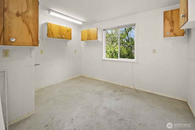 852 NE 194th St, Shoreline, WA 98155 - spare room featuring unfinished concrete flooring