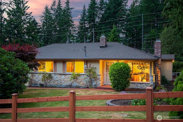 852 NE 194th St, Shoreline, WA 98155 - view of front of home with a chimney, roof with shingles, and stone siding