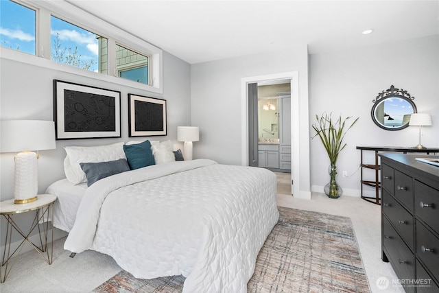 6801 Greenwood Ave N Unit 403, Seattle, WA 98103 - bedroom featuring carpet floors, ensuite bathroom, and recessed lighting