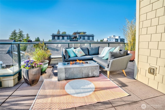 6801 Greenwood Ave N Unit 403, Seattle, WA 98103 - balcony featuring an outdoor living space with a fire pit