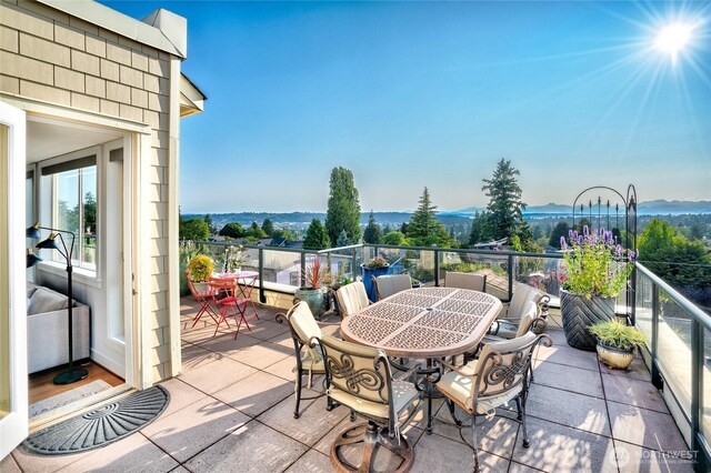 6801 Greenwood Ave N Unit 403, Seattle, WA 98103 - patio / terrace featuring a mountain view