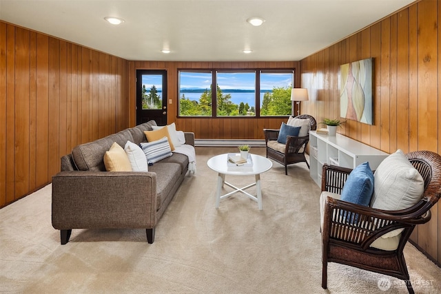 19212 94th Ave W, Edmonds, WA 98020 - living area with light colored carpet, wood walls, and a baseboard radiator