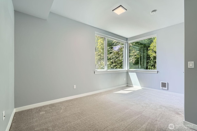 3540 S Graham St, Seattle, WA 98118 - carpeted empty room with baseboards and a smoke detector