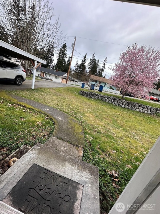 7702 202nd Pl SW, Edmonds, WA 98026 - view of grassy yard with a carport