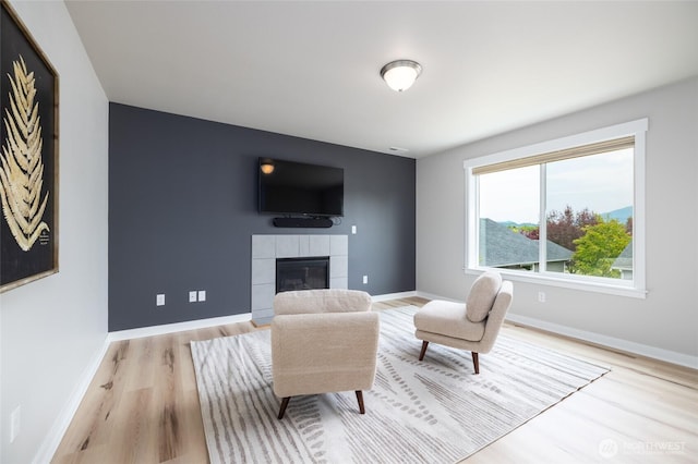 3885 Summersun St, Mount Vernon, WA 98273 - living area with wood finished floors and a fireplace