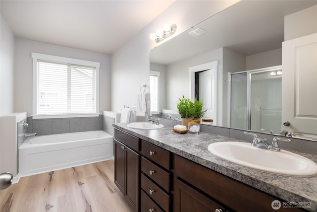 3885 Summersun St, Mount Vernon, WA 98273 - full bath with double vanity, a bath, healthy amount of natural light, and a stall shower