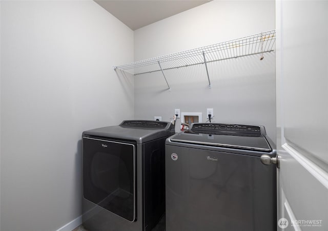 3885 Summersun St, Mount Vernon, WA 98273 - washroom with washing machine and clothes dryer and baseboards