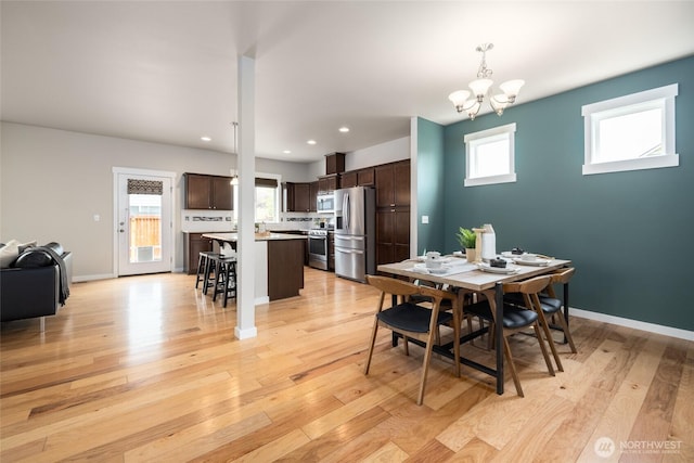 3885 Summersun St, Mount Vernon, WA 98273 - dining space featuring a chandelier, light wood-type flooring, and recessed lighting