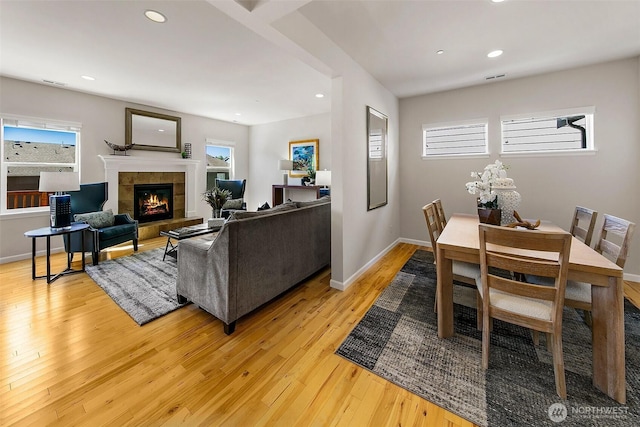 7649 NE 196th St, Kenmore, WA 98028 - living area with a tile fireplace, light wood-type flooring, and recessed lighting