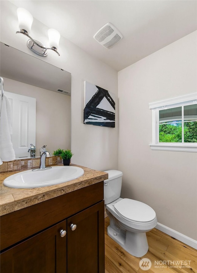 7649 NE 196th St, Kenmore, WA 98028 - bathroom with vanity and wood finished floors
