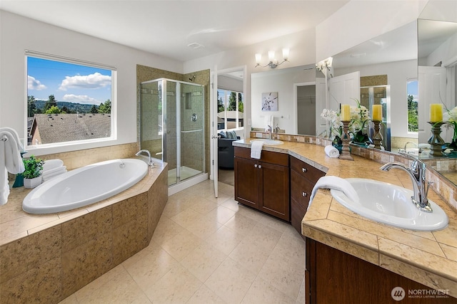 7649 NE 196th St, Kenmore, WA 98028 - bathroom with vanity, a stall shower, a bath, tile patterned floors, and a closet
