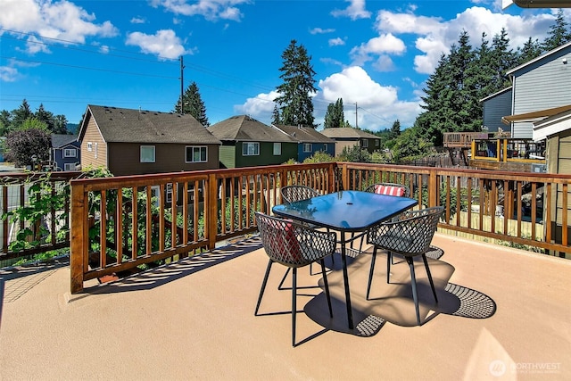 7649 NE 196th St, Kenmore, WA 98028 - wooden terrace with a residential view and outdoor dining space