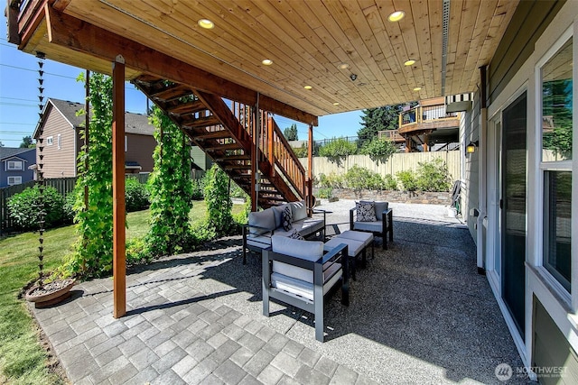 7649 NE 196th St, Kenmore, WA 98028 - fenced backyard featuring a patio, an outdoor living space, and stairs