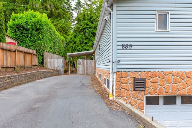 889 NE Sleepy Way, Bremerton, WA 98311 - view of side of property featuring asphalt driveway