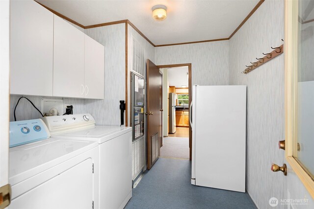 889 NE Sleepy Way, Bremerton, WA 98311 - laundry area featuring cabinet space, ornamental molding, wallpapered walls, washer and dryer, and carpet floors