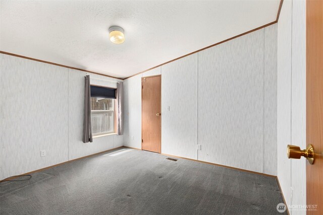 889 NE Sleepy Way, Bremerton, WA 98311 - carpeted empty room featuring ornamental molding and a textured ceiling