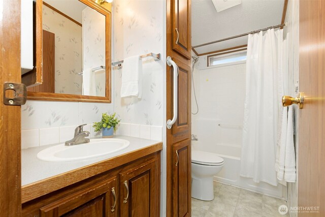 889 NE Sleepy Way, Bremerton, WA 98311 - bathroom featuring vanity and shower / bath combo with shower curtain
