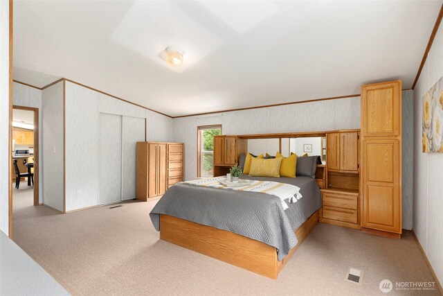 889 NE Sleepy Way, Bremerton, WA 98311 - bedroom with light carpet, ornamental molding, and vaulted ceiling