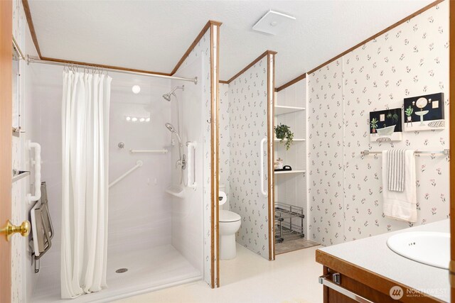 889 NE Sleepy Way, Bremerton, WA 98311 - bathroom with a shower stall, vanity, and wallpapered walls