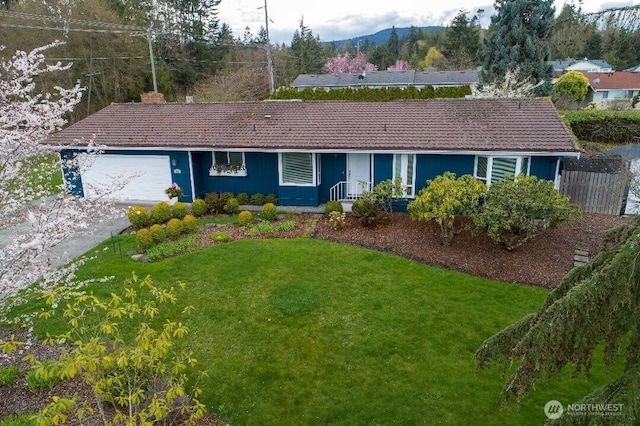 301 Norman St, Sequim, WA 98382 - single story home with a garage, a mountain view, and a chimney