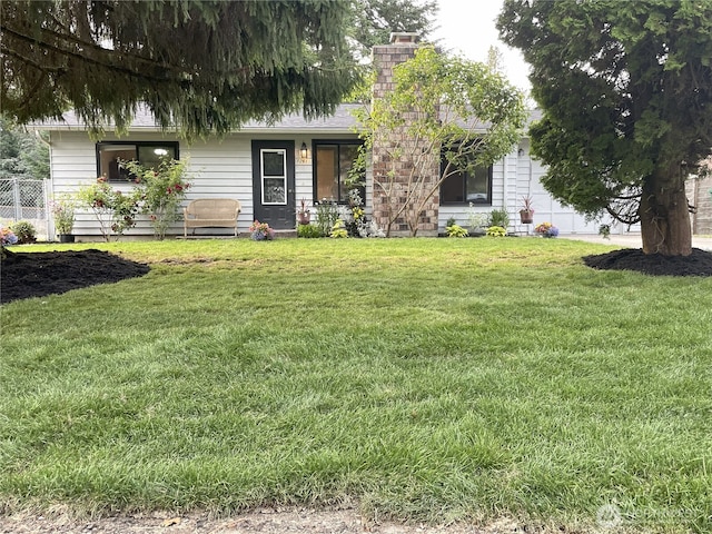 12611 50th Dr SE, Everett, WA 98208 - view of front of house with a chimney and a front yard