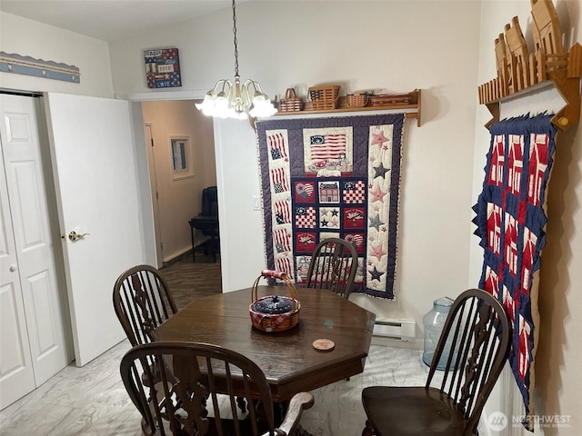 12611 50th Dr SE, Everett, WA 98208 - dining space featuring a baseboard radiator, a chandelier, and marble look tiles