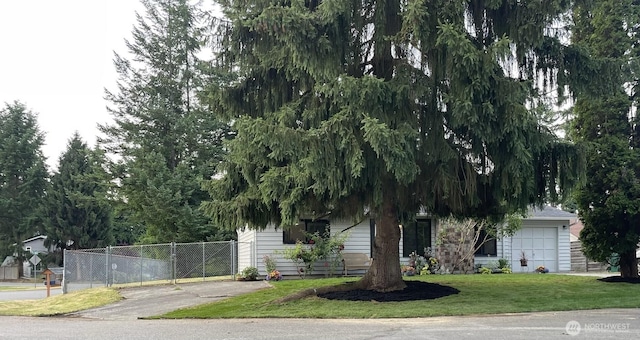 12611 50th Dr SE, Everett, WA 98208 - view of property hidden behind natural elements with a gate