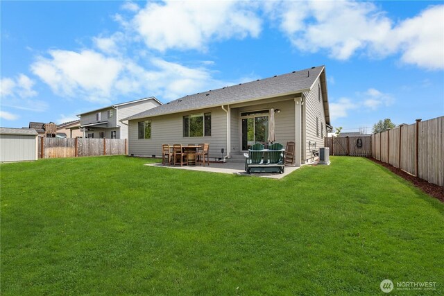 225 N Mcneely St, Buckley, WA 98321 - rear view of house featuring a fenced backyard and a patio area