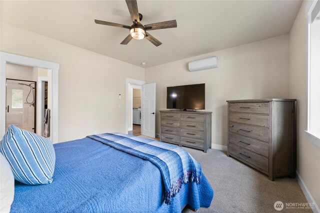 225 N Mcneely St, Buckley, WA 98321 - carpeted bedroom with a wall mounted AC, ceiling fan, and connected bathroom