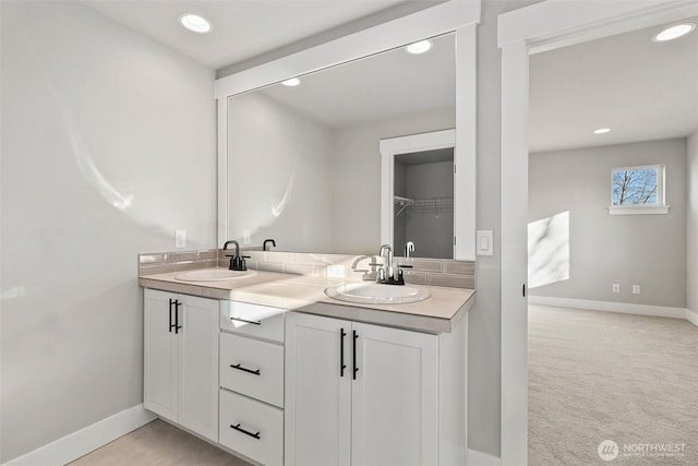 15705LOT13 SE 257th St, Covington, WA 98042 - full bathroom featuring double vanity, tasteful backsplash, and recessed lighting