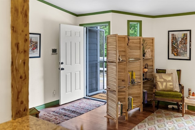 12543 Bear Track Ln SW, Port Orchard, WA 98367 - entrance foyer featuring wood finished floors and ornamental molding
