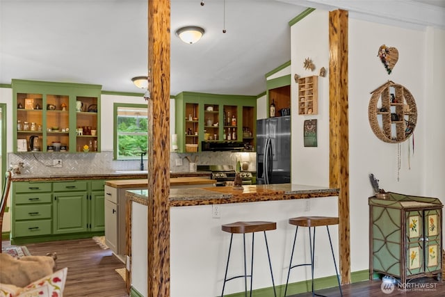 12543 Bear Track Ln SW, Port Orchard, WA 98367 - kitchen featuring black fridge, open shelves, tasteful backsplash, ventilation hood, and stainless steel electric range oven