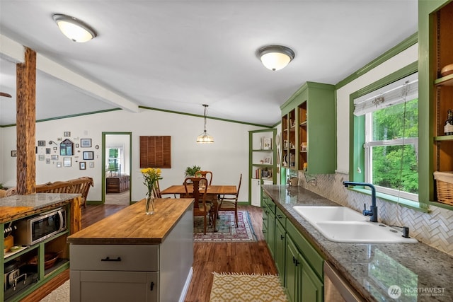 12543 Bear Track Ln SW, Port Orchard, WA 98367 - kitchen with green cabinets, butcher block countertops, open shelves, stainless steel appliances, and dark wood-style floors