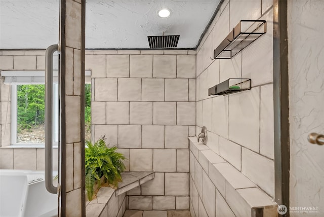 12543 Bear Track Ln SW, Port Orchard, WA 98367 - bathroom with a tile shower and a bathtub