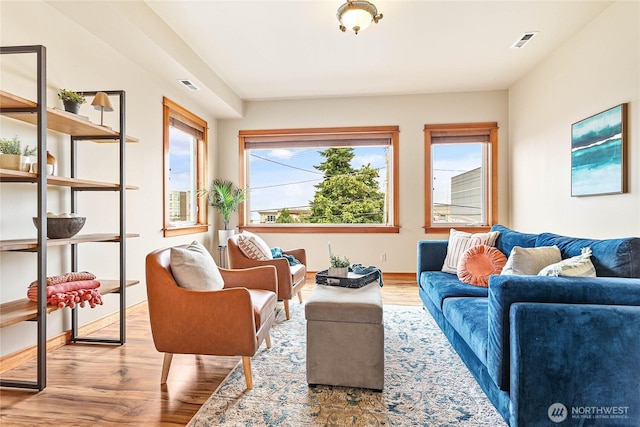 1007 N Forest St, Bellingham, WA 98225 - living room featuring wood finished floors and baseboards