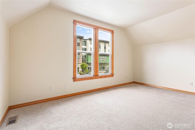 1007 N Forest St, Bellingham, WA 98225 - additional living space featuring vaulted ceiling and carpet