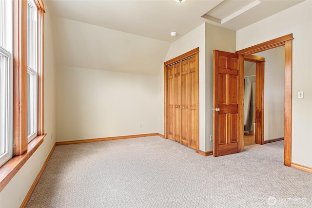 1007 N Forest St, Bellingham, WA 98225 - unfurnished bedroom featuring carpet, a closet, vaulted ceiling, and attic access
